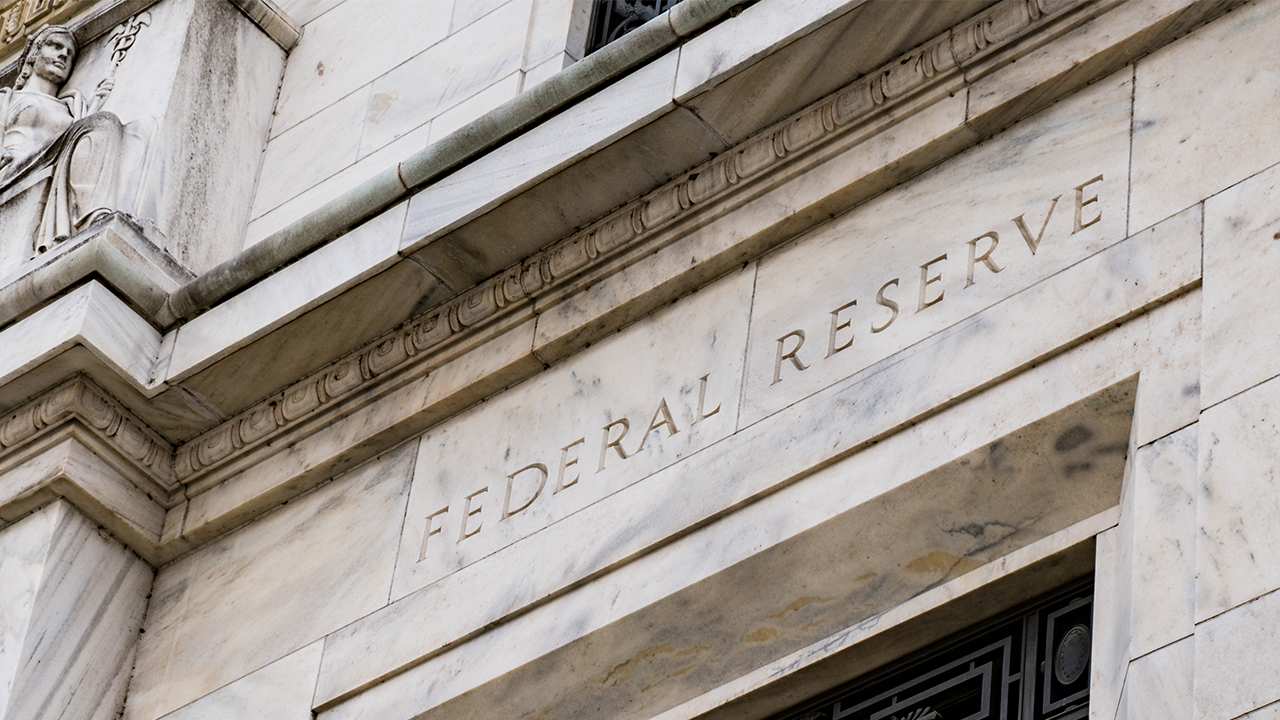 Federal Reserve Bank entrance. Exterior view with the words "Federal Reserve" etched in the stone façade.